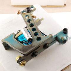 This is a handmade coil tattoo machine made for shading and coloring tattoos with tattoo ink and made for professional tattoo artists.