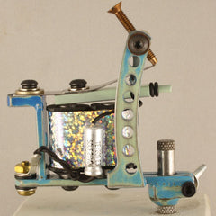 This is a handmade coil tattoo machine made for shading and coloring tattoos with tattoo ink and made for professional tattoo artists.