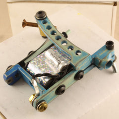 This is a handmade coil tattoo machine made for shading and coloring tattoos with tattoo ink and made for professional tattoo artists.